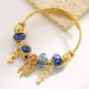 oly-afd0ba1902b5c5246f90beb0c15075f6 Wholesale Pumeng.com Key Pendant Bracelet for Women - Trendy, Fashionable, Versatile, Stainless Steel Adjustable Bangle