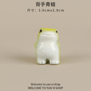Standing frog with one hand behind its back