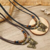 Wholesale retro butterfly alloy multi-layer wooden beads knotted hand-woven necklace jewelry