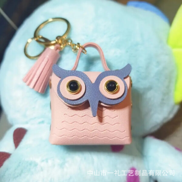 oly-b11b7939e3e3440bced011fd061fd49a Wholesale New Pu Leather Owl Coin Purse Cute Cartoon Bluetooth Headset Bag Fashion Tassel Car Key Pendant