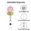 oly-b143465078547bfb8344c881461f1659 Wholesale New acrylic smiley face flower cute mini quicksand rocking retractable rotating badge clip easy pull buckle