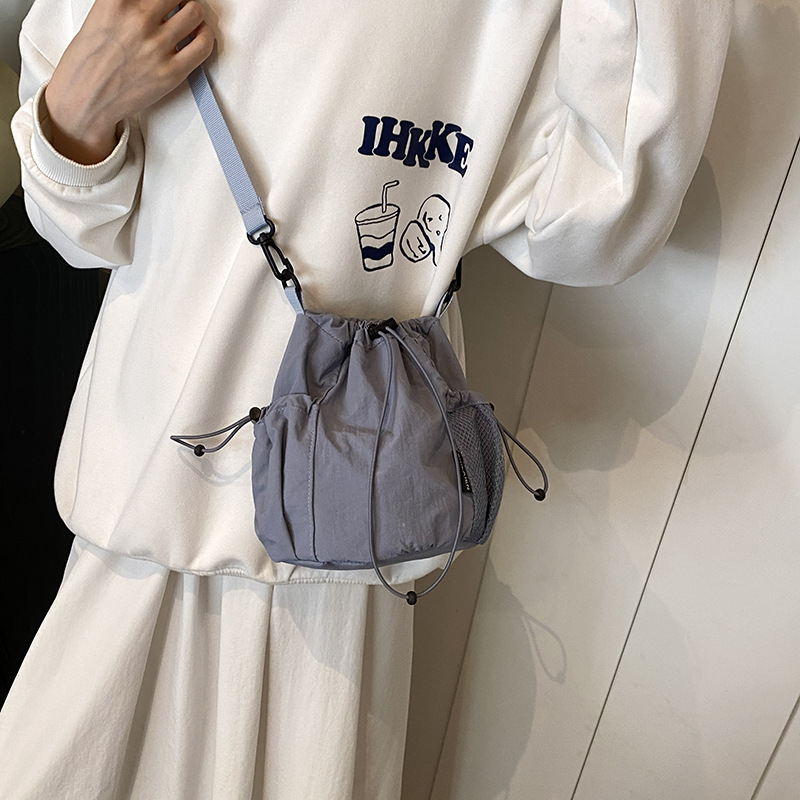 Wholesale Japanese Style Ins Niche Design awstring Bucket Outdoor Srts Casual Fashion All-match Nylon Crossbody Bag
