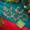 Wholesale Creative Christmas Jewelry: Santa Claus, Christmas Tree, Multicolored Candy Pendant, Pearl Paper Card Bracelet