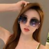oly-b29abf17dca9d5e3ccd9324b2432f35b Wholesale 2025 European and American Fashion Women's Frameless Sunglasses Anti-UV Cyber Celebration Retro Gradient Large Frame Sunglasses