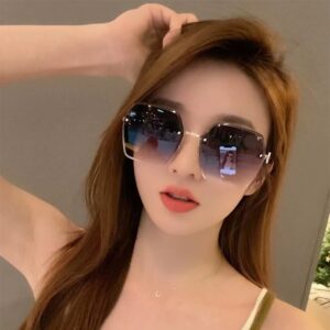 Wholesale 2025 European and American Fashion Women's Frameless Sunglasses Anti-UV Cyber Celebration Retro Gradient Large Frame Sunglasses
