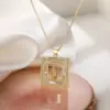 Wholesale Simple Style Commute Portrait Copper 18k Gold Plated Shell Zircon Pendant Necklace In Bulk