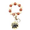oly-b3aa6549e57544685af660e02bdfb926 Wholesale sports style football basketball baseball and other wooden beads beaded polar bear