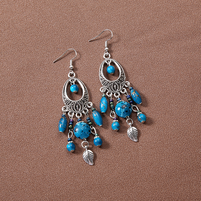 Wholesale Bohemian retro ethnic style European and American ancient sier earrings goddess jewelry face slimming earrings tassel long earrings