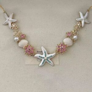 Pink metal starfish necklace