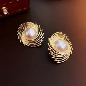 Silver Needle surrounding pearl earrings