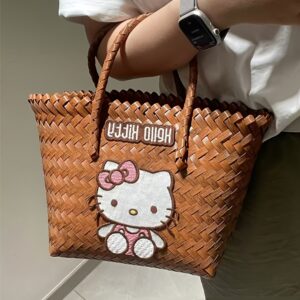 Brown hand basket with kt letter cat