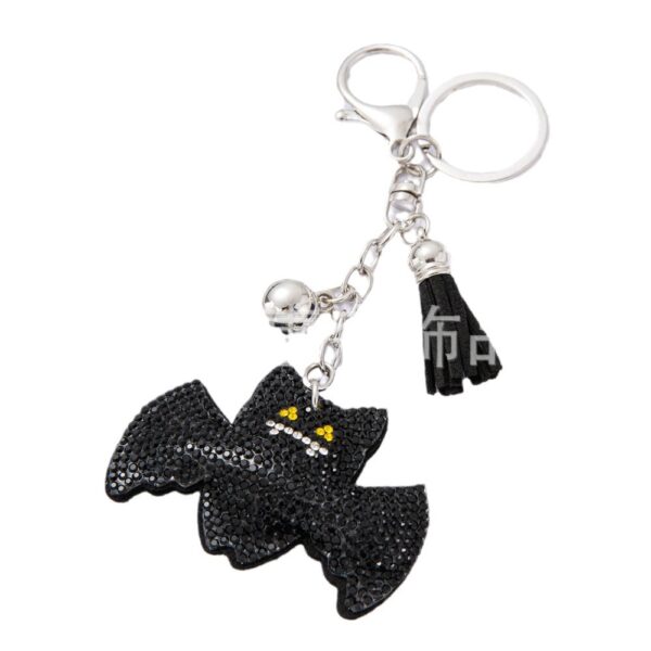 oly-b47dfd7d5733e4cbd305c01e24ca011d Wholesale Diamond studded bat keychain