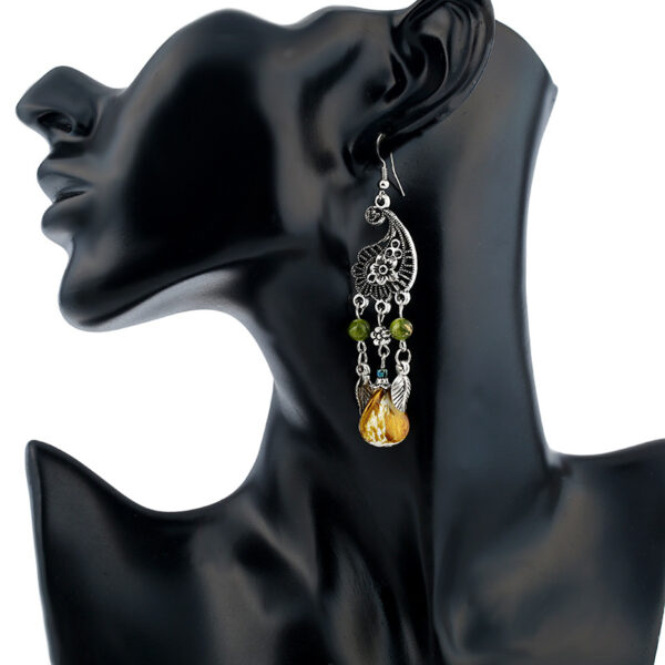 Wholesale European and American fashion retro hollow carved leaves tassel earrings new big-name temperament National style earrings