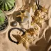 Wholesale 304 Stainless Steel Starfish PVD Coated 18K Real Gold Plated Real Gold Plated Vacation Simple Style Waterproof Non Tarnish Star Gold Rings