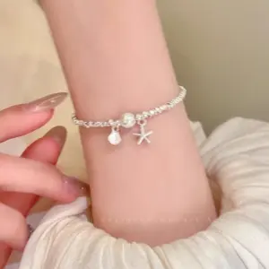 S696 Silver - Broken Silver Starfish Shell Beaded Bracelet