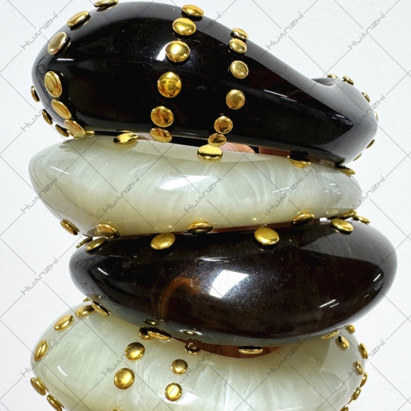 Wholesale Exaerated large studded resin bracelet, uniquely shaped color-blocked jewelry