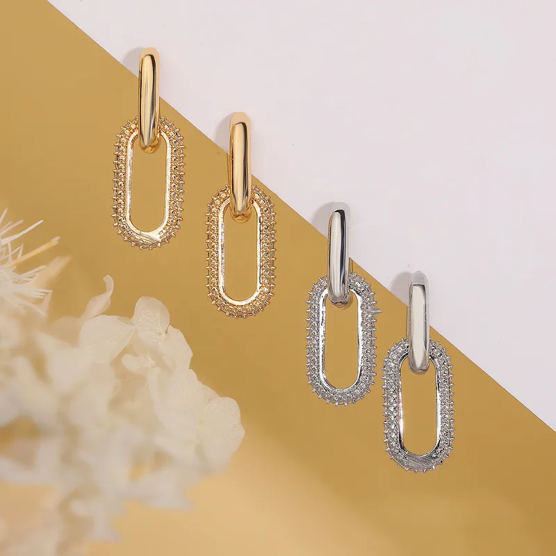 Wholesale 1 Pair Simple Style Commute Oval Plating Inlay Copper Zircon 18k Gold Plated op Earrings