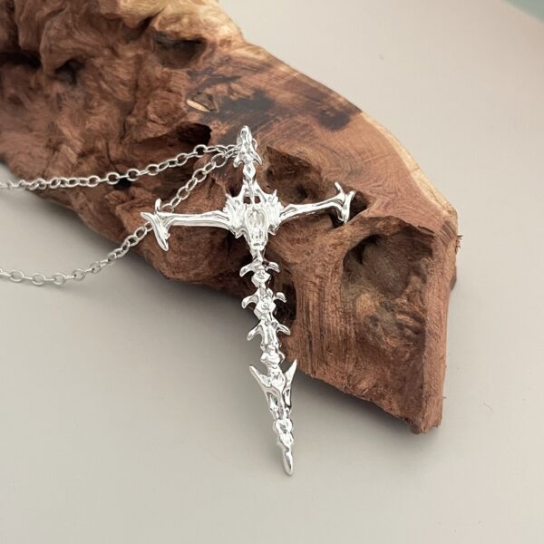 oly-b7784d84315983332b9c5e245f5e4776 Wholesale Personalized Chiropractic Cross Necklace Couple's Hollow Retro Bones Dark Pendant Stereo Double-Sided Punk Necklace