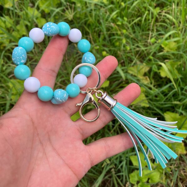 oly-b7cf15598397c097aad74bec52399459 Wholesale Colorful beaded heart-shaped printed tassel bracelet/keychain