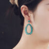 oly-b829027f7b615add9d5e9b781ba590cf Wholesale Europe and the United States exaggerated earrings retro oval turquoise drop hollow earrings earrings foreign trade jewelry