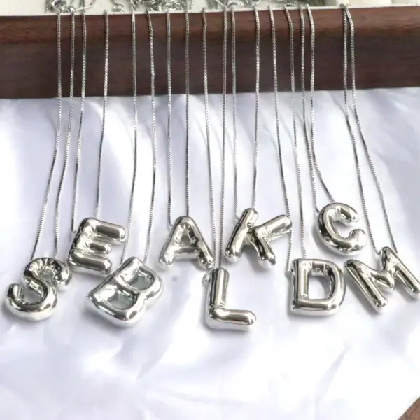 Wholesale Simple Style Classic Style Letter Copper Silver Plated Pendant Necklace In Bulk