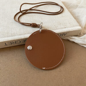 Brown round leather snap headphone storage necklace
