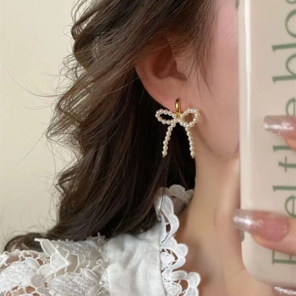 Wholesale Lady Style Bow Pearl Earrings 2024 New Style Gentle Girl Ear Buckle French Retro Earrings High Earrings