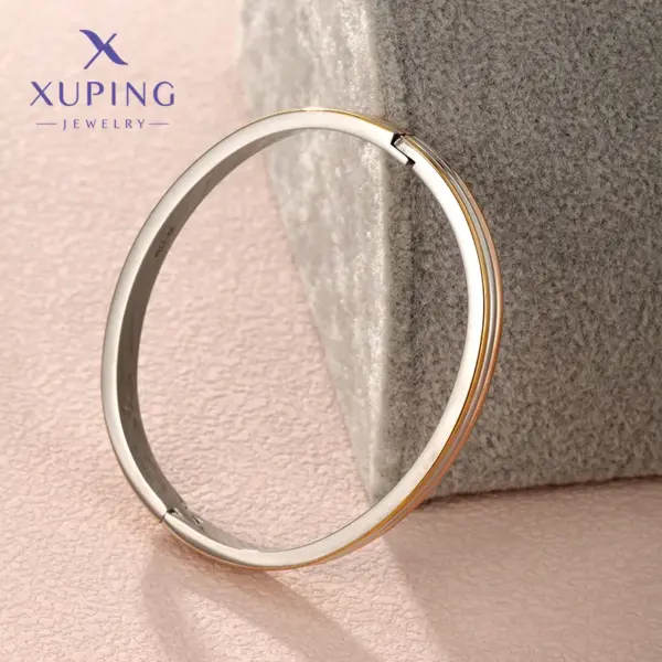 Wholesale Elegant XUPING Simple Style Color Block 304 Stainless Steel 18K Gold Plated Raw Steel Bangle In Bulk