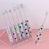 oly-ba9fcabf9510735fe58dd69410a30ff6 Wholesale Cross-border Live Hot Valentine's Day Colorful Love Zircon Full Diamond Pen Ceramic Mud Beaded Pen DIY Beaded Ballint Pen