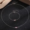 oly-bb1a777c2800c19e1f7962b81ee23809 Wholesale Versatile heart necklace with a simple yet sophisticated peach heart pendant