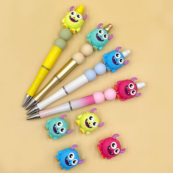 oly-bb4e2aad12e7ca4a3258565be2e45699 Wholesale Cross-Border New Food Grade 3D Silicone Monster Teether Beads Keychain Can Be Used as Pen Accessories Ready for Sale
