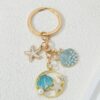 Wholesale Cross-border starfish shell keychain creative oil pearl keychain bag pendant girls pvc key chain