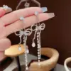 Wholesale Retro Geometric Star Bow Knot Copper Inlay Zircon Drop Earrings 1 Pair