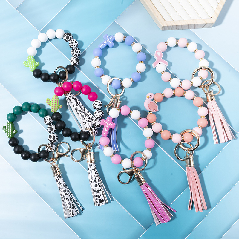 Wholesale New cross-border hot selling silicone beaded bracelet keychain pendant PU leather tassel cactus cross aessories