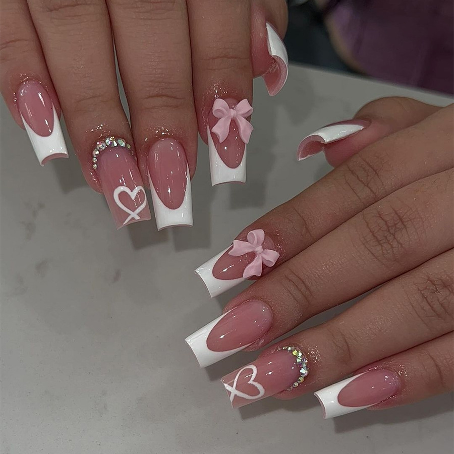 Wholesale Cross-border hand-worn armor wholesale 24 pieces of long nail pieces love bow French fake nails nail pieces