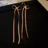 Wholesale 1 Pair Simple Style Bow Knot Plating Copper 18K Gold Plated Drop Earrings
