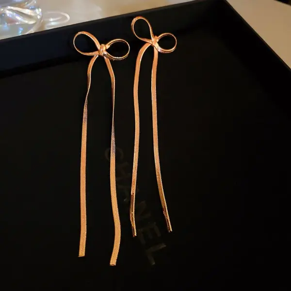 Wholesale 1 Pair Simple Style Bow Knot Plating Copper 18K Gold Plated Drop Earrings
