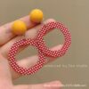 Wholesale Europe and the United States cross-border personality retro Hong Kong style playful girl red exaggerated wave point large ring earrings ear clip