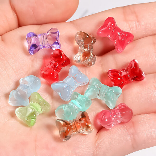 oly-bf8fb42b3f75561f3f550b0da625ca98 Wholesale Colored glass bow bead
