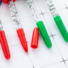 Wholesale Christmas ballpoint pen with colorful glitter and ink-filled design, Christmas hat pen