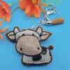oly-c04f0fc614049acf5e2ef4007a71a5b5 Wholesale 4pcs Creative Cartoon Diamond-encrusted Cow Keychain