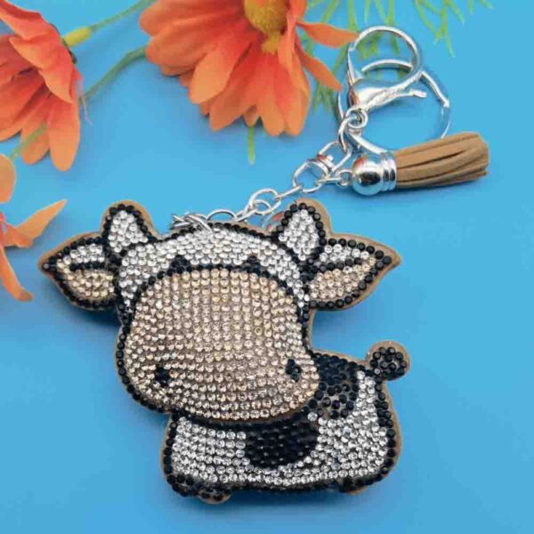 oly-c04f0fc614049acf5e2ef4007a71a5b5 Wholesale 4pcs Creative Cartoon Diamond-encrusted Cow Keychain