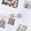 Wholesale Hollow petal inlaid turquoise drop earrings