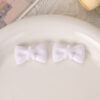 Wholesale Cute macaron-colored perforated five-pointed star bow tie beaded bracelet