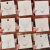 Wholesale Modern Style Geometric Heart Shape Bow Knot Titanium Steel Copper Plating Inlay Zircon Pendant Necklace