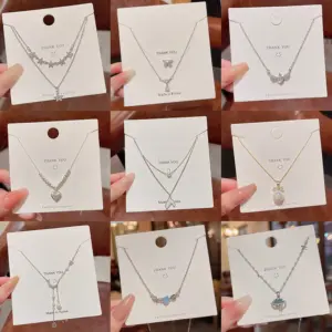 Wholesale Modern Style Geometric Heart Shape Bow Knot Titanium Steel Copper Plating Inlay Zircon Pendant Necklace