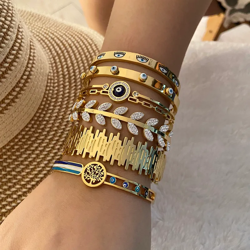 Wholesale PVD Coated 18K Gold Real Gold Plated Tree Leaves Eye Stainless Steel Casual Waterproof Non Tarnish Bangle