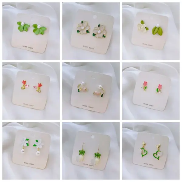 1 Pair Fairy Style Sweet Leaf Flower Spray Paint Inlay Imitation Pearl Alloy Cat's Eye Stone Zircon Earrings