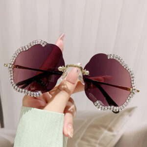 Wholesale 2024 New lygon Shaped Diamond Trimmed Frameless Flower Wave Sunglasses Retro Sunglasses