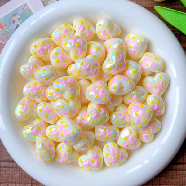 oly-c4872db0539aeaaa54d6f245c522fca5 Wholesale Acrylic Hand-painted Cut-out Luminous Love Beads